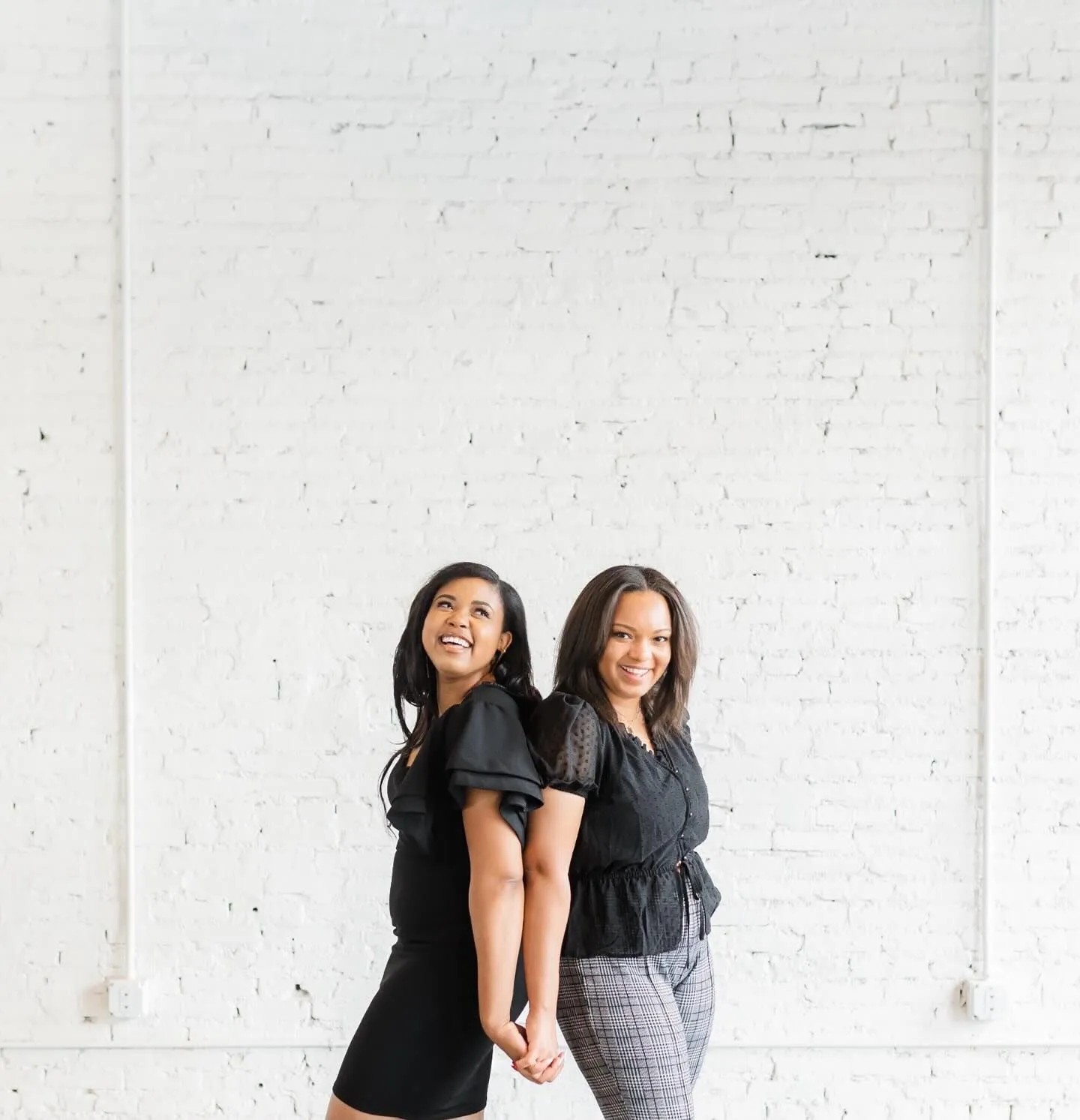 LRC Social team members smiling in a bright studio