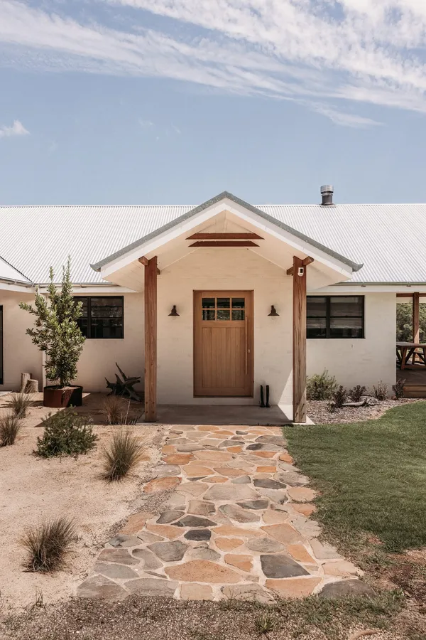 Wallaringa Farm accommodation exterior and garden path used in brand storytelling