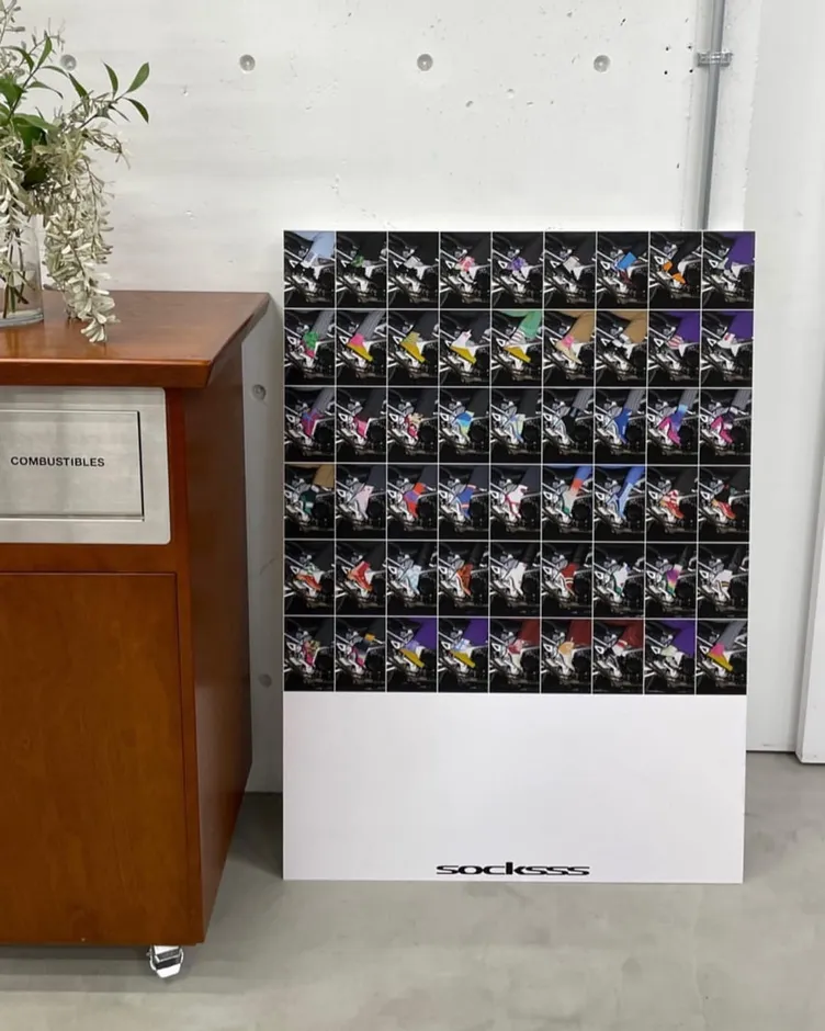 SOCKSSS campaign board displayed at the Tokyo showroom